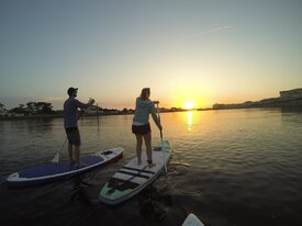 Balade en paddle au coucher du soleil à Mimizan